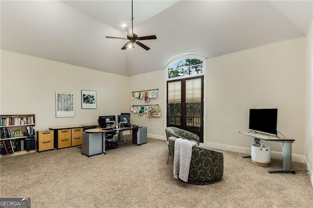 carpeted office space with high vaulted ceiling, ceiling fan, baseboards, and french doors