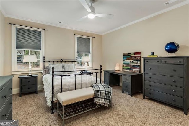 bedroom with visible vents, baseboards, crown molding, and light colored carpet