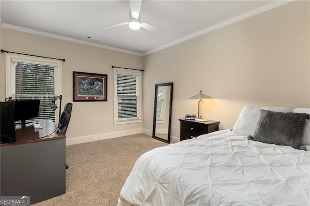 carpeted bedroom featuring baseboards, a ceiling fan, and ornamental molding