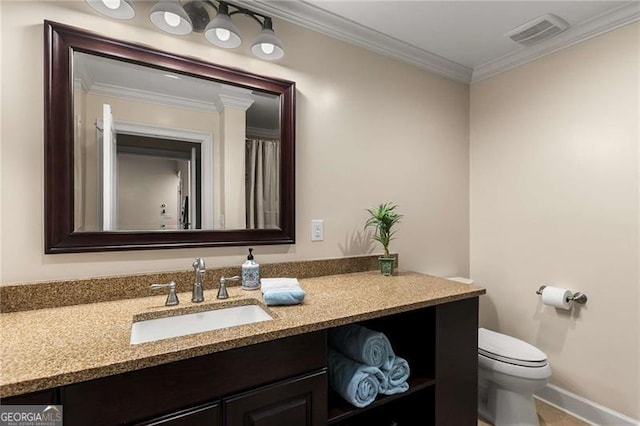 bathroom with visible vents, crown molding, vanity, and toilet