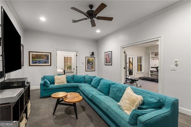 living room with ornamental molding, dark colored carpet, baseboards, and recessed lighting