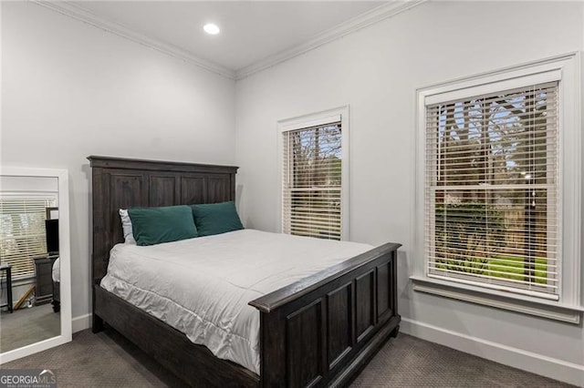 bedroom with dark carpet, recessed lighting, crown molding, and baseboards