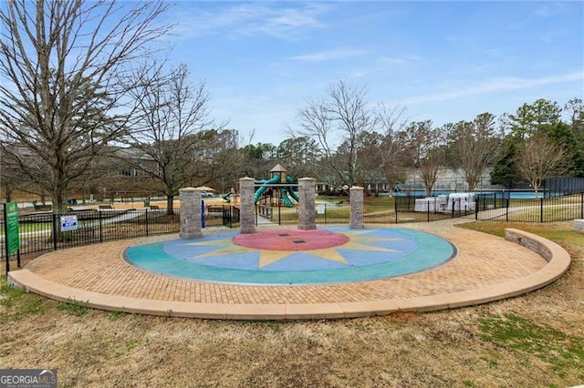 surrounding community featuring playground community and fence