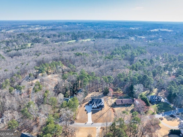 bird's eye view featuring a view of trees