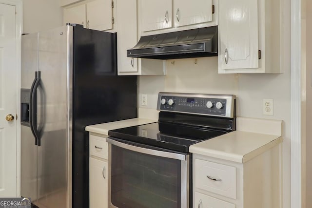 kitchen with under cabinet range hood, white cabinetry, stainless steel appliances, and light countertops