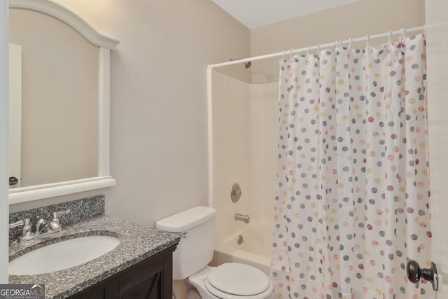 full bath featuring toilet, shower / bath combination with curtain, and vanity