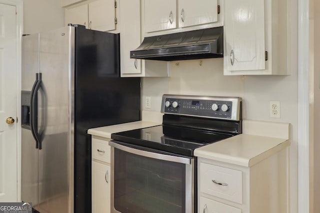 2 Hickory Rd, Rincon, GA 31326 - kitchen with appliances with stainless steel finishes, exhaust hood, light countertops, and white cabinets