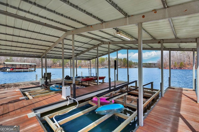 dock area featuring a water view and boat lift