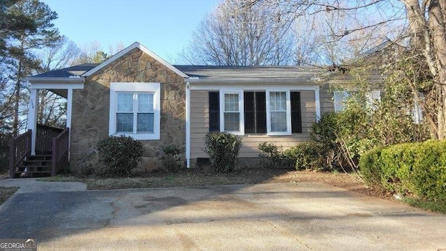 view of home's exterior featuring stone siding