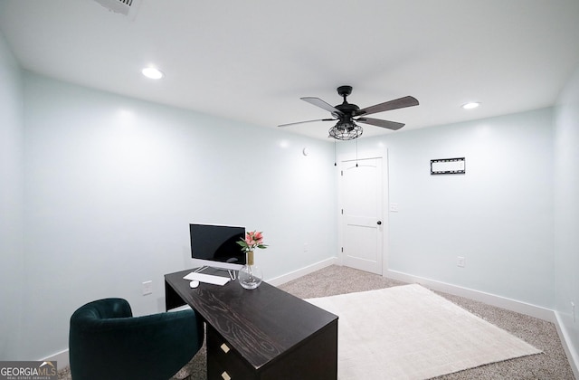 carpeted office space with ceiling fan, recessed lighting, visible vents, and baseboards