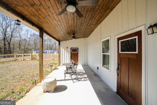 view of patio / terrace featuring fence and a ceiling fan