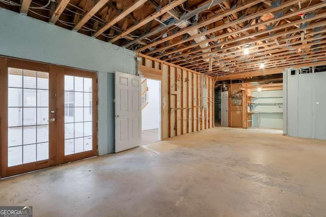 below grade area with a garage and french doors