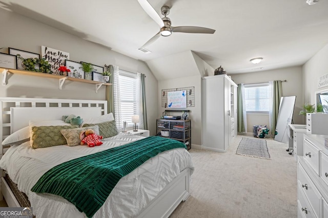 4590 Gablestone Xing, Hoschton, GA 30548 - bedroom featuring light colored carpet, multiple windows, baseboards, vaulted ceiling, and ceiling fan
