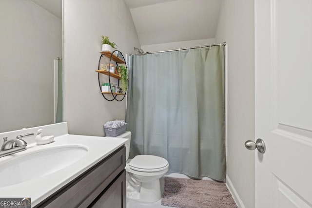 4590 Gablestone Xing, Hoschton, GA 30548 - bathroom featuring vanity, lofted ceiling, toilet, and a shower with curtain