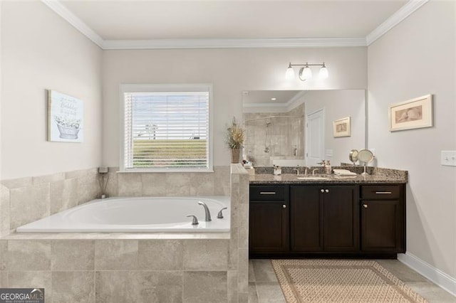 bathroom featuring ornamental molding, a garden tub, a shower stall, and vanity