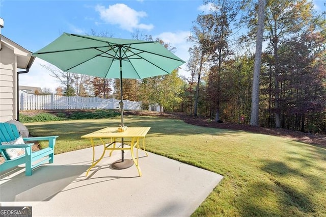 view of yard featuring a patio area and fence