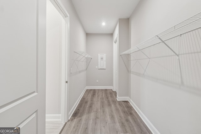 spacious closet with wood finished floors