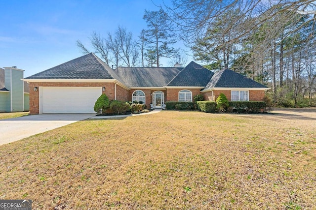 single story home featuring a garage, brick siding, driveway, and a front lawn