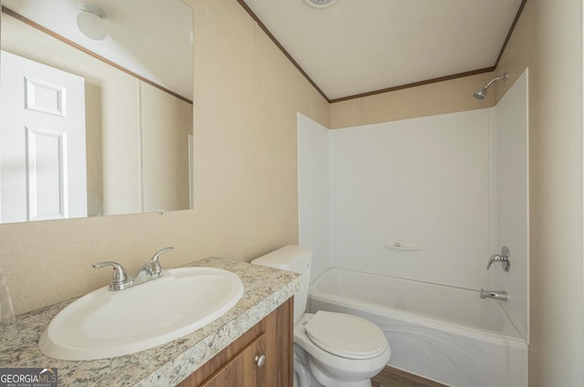 full bath with  shower combination, ornamental molding, vanity, and toilet