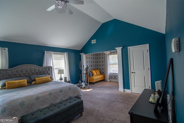 bedroom featuring baseboards, visible vents, a ceiling fan, lofted ceiling, and carpet