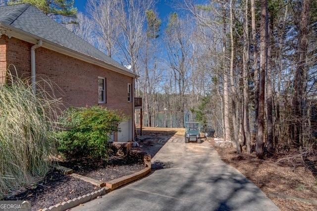 view of home's exterior featuring brick siding