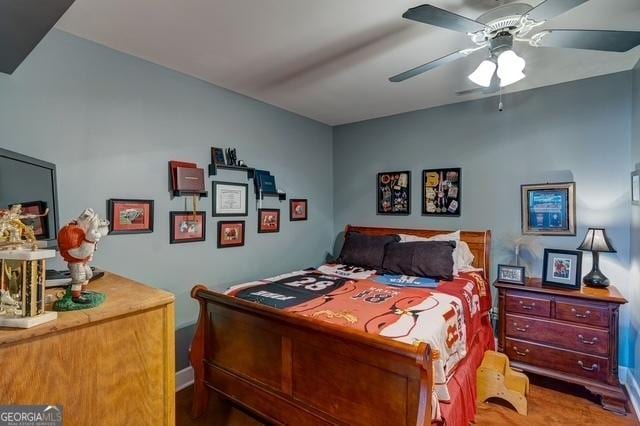 bedroom featuring wood finished floors