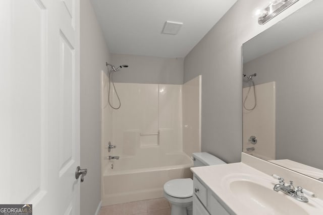 full bath featuring shower / bath combination, vanity, toilet, and tile patterned floors