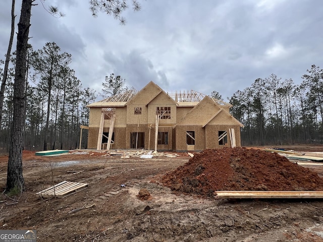 unfinished property with stucco siding