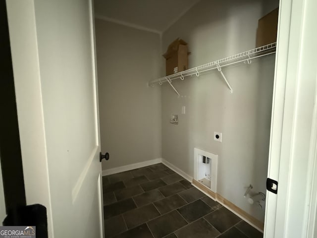 laundry area featuring laundry area, baseboards, and electric dryer hookup