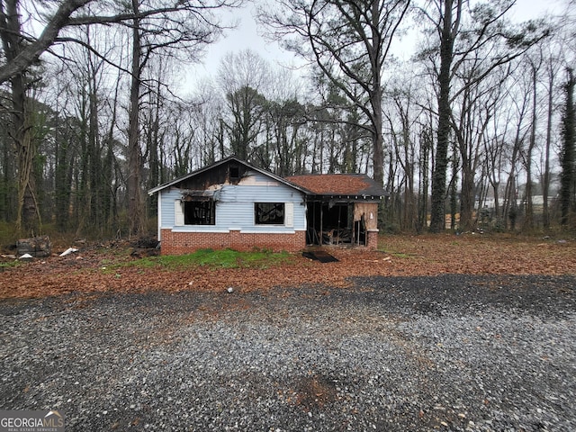 view of front of home with brick siding