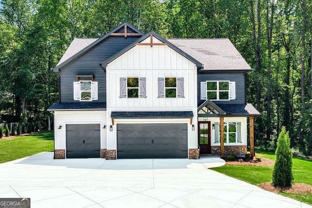 modern farmhouse with a front lawn, board and batten siding, concrete driveway, an attached garage, and brick siding