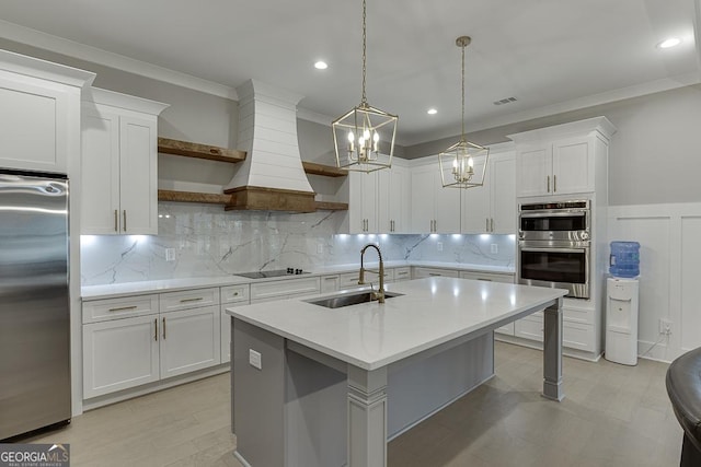 kitchen featuring a sink, open shelves, light countertops, and stainless steel appliances