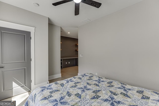 bedroom with visible vents and ceiling fan