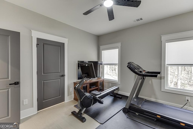 workout room featuring visible vents, baseboards, and ceiling fan