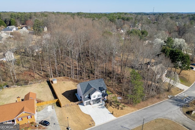 aerial view with a wooded view