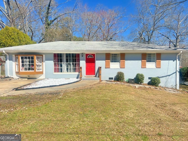 single story home with crawl space, brick siding, and a front yard