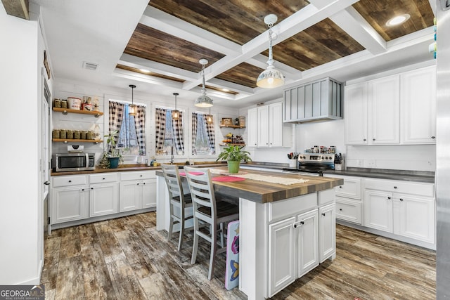 kitchen with open shelves, appliances with stainless steel finishes, dark wood-type flooring, wood counters, and coffered ceiling