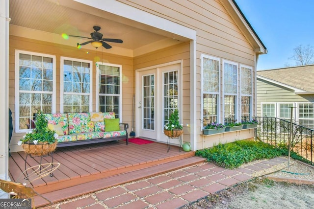 exterior space with a ceiling fan