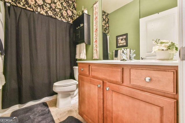 full bath featuring tile patterned flooring, vanity, and toilet