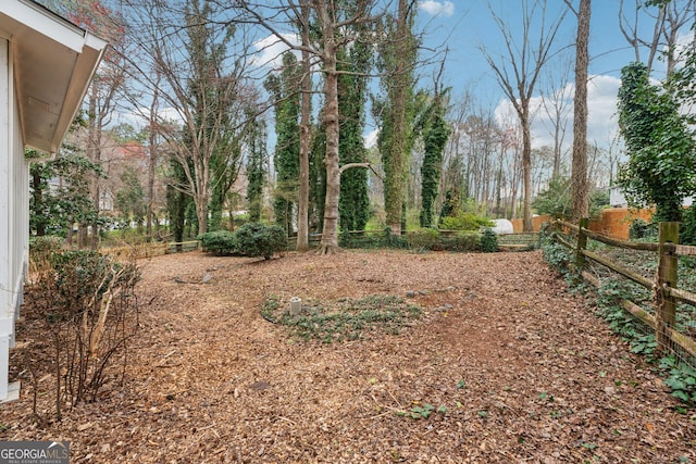 view of yard featuring fence