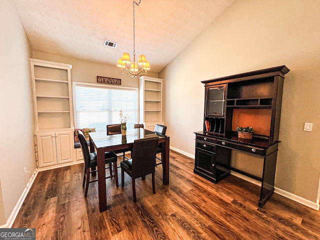 dining space with vaulted ceiling, a textured ceiling, an inviting chandelier, and dark wood-style flooring