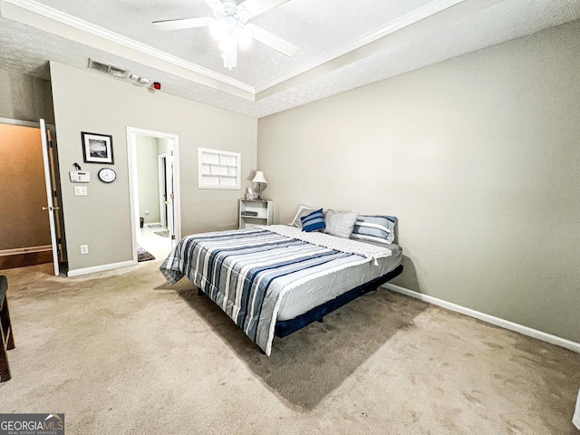 carpeted bedroom with baseboards and ornamental molding