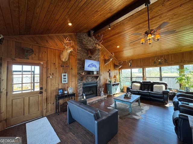 living area featuring wood ceiling, wooden walls, and wood finished floors