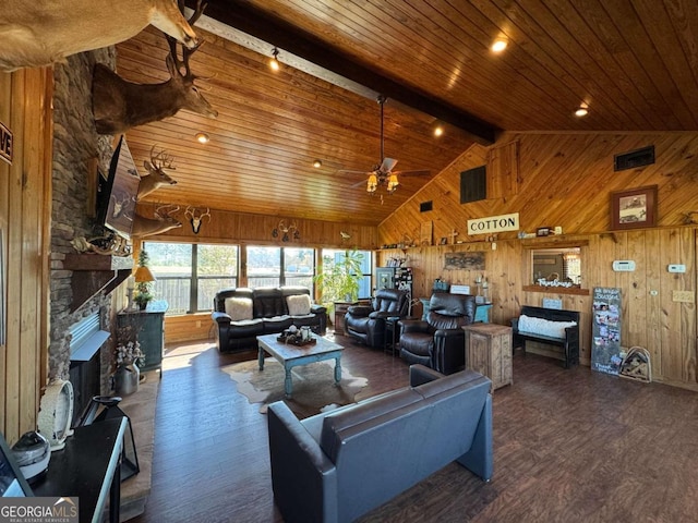 living area with wood walls and a fireplace