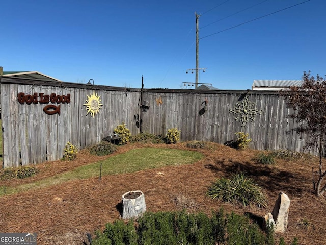 view of yard with fence