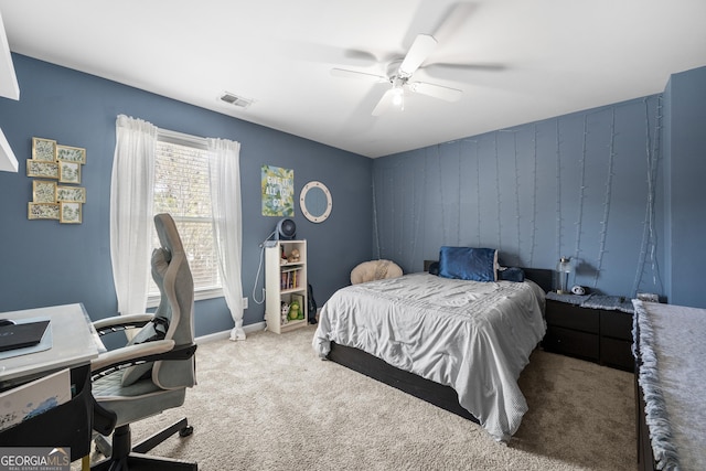 bedroom with visible vents, carpet flooring, a ceiling fan, and baseboards