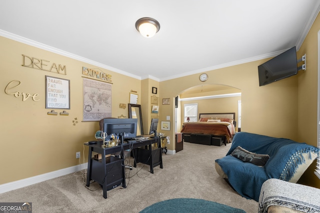 carpeted bedroom with baseboards, arched walkways, and ornamental molding