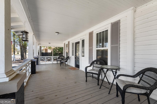 wooden deck with a porch