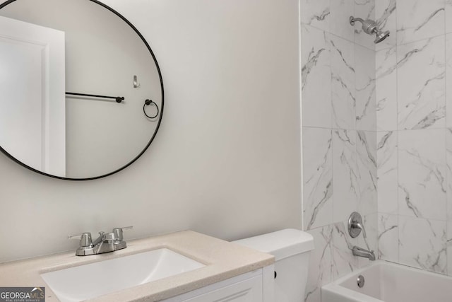 bathroom with  shower combination, toilet, and vanity