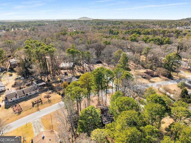 bird's eye view with a view of trees